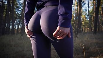 Play Hot Babe In Super Tight Yoga Pants Teasing Her Amazing Ass In The Forest