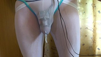 Play Cumming with e-stim and chastity cage through panties