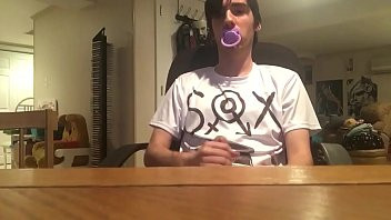 Play Boy jerks off w/ paci in mouth